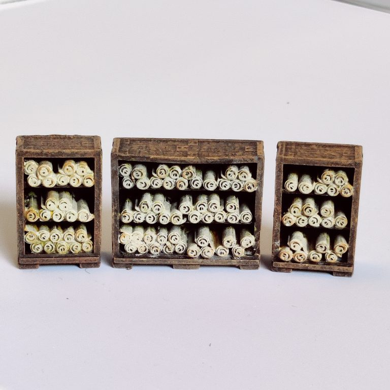 A pack of three Scroll Cabinets by Iron Gate Surrounds printed in resin to a 28mm scale. With one large scroll cabinet and two small scroll cabinets to help you dress your sorcerers workshop, RPGs, dungeon settings, tabletop games and more 
