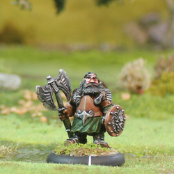 Dutki of Jietna Guild by Oakbound Studio. A lead pewter miniature of a gnome holding an axe and a shield