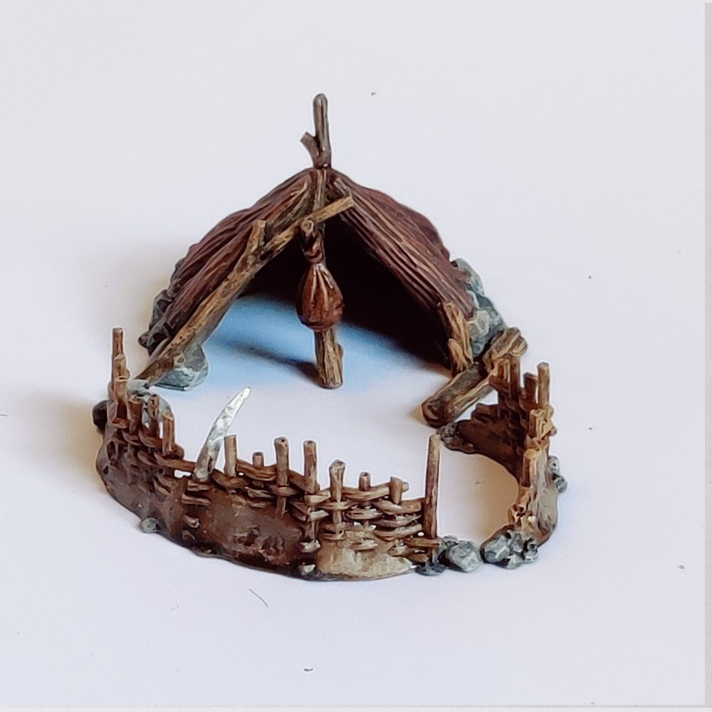 A Chicken Den & Fencing from Iron Gate Scenery designed by Stone Axe Mins in 28mm scale produced in resin, being great for your tabletop gaming, prehistoric scenery, RPGs and hobby dioramas