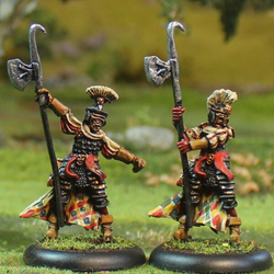 Alvi D’Arme 3 by Oakbound Studio. A pack of two lead pewter miniatures holding polearm style weapons, wearing armour and headdresses, great for your tabletop and RPGs. 