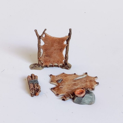 A 28mm scale Tannery from Irongate Scenery printed in PLA containing one tannery rack, one tannery block and one rolled up hide for your tabletop games, RPGs, rustic settings and other gaming and hobby needs.&nbsp;