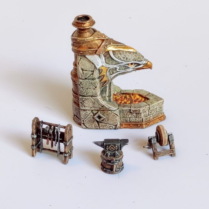 A 28mm scale Eagle Forge & Accessories by Iron Gate Scenery printed in resin with one eagle forge, one anvil, one whetstone and one tool rack for your table top gaming scenery, town scenery, Dwarvern settings, RPGs and more.