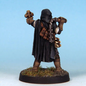 Female cleric miniature holding ...