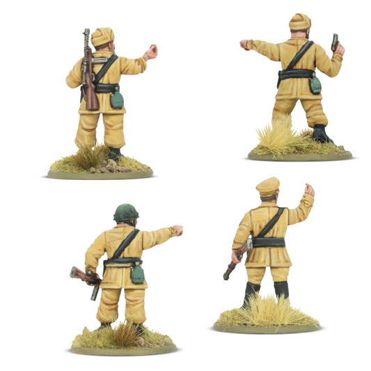 Toy soldiers in desert setting w...