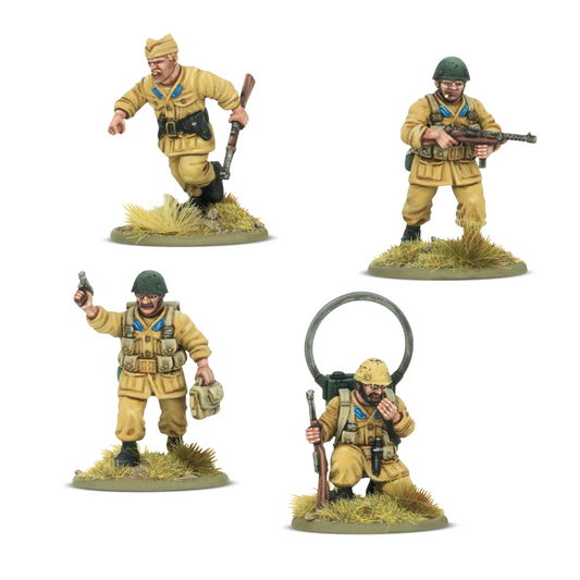 Toy soldiers in desert setting w...