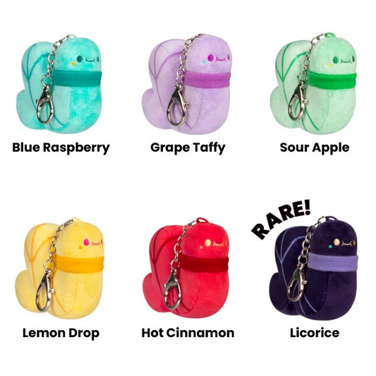 A turquoise plush worm keychain ...