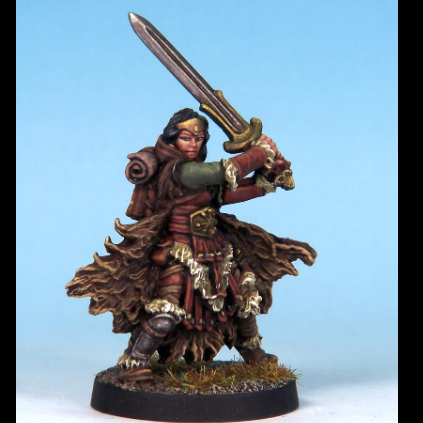 Female barbarian miniature holdi...