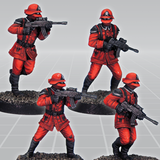 Scarlet Shocktroopers by Crooked Dice a set of four white metal miniatures for your tabletop games representing a team of soldiers holding guns and wearing boots.