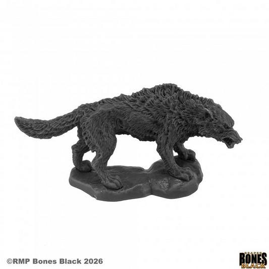 Grey wolf figurine on a white ba...
