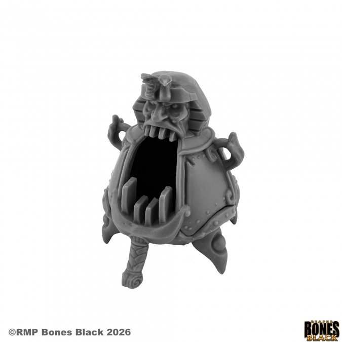 A gray unpainted miniature accessory representing a goblin or monster's mouth and teeth, shown on a plain white background with copyright text in the corner. 44365 Immolating Effigy Construct - Reaper Bones Black