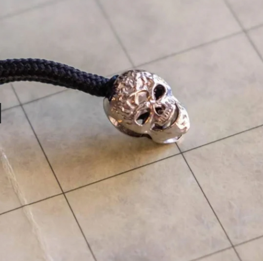 Teal velvet dice bag with a D20 ...