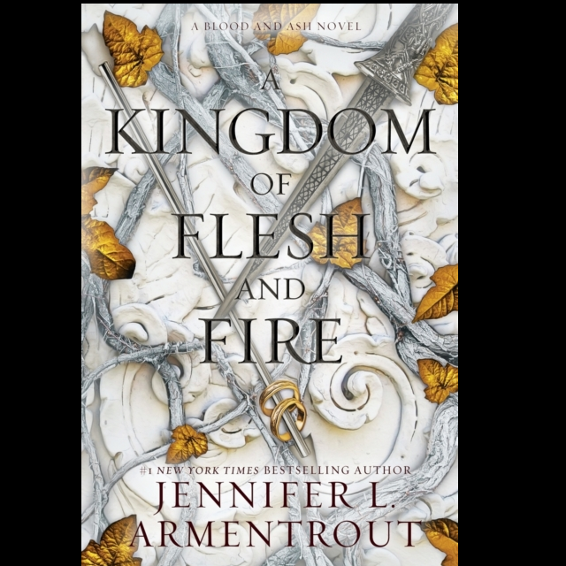 A Kingdom of Flesh and Fire by Jennifer L Armentrout the second book in the From Blood and Ash series . A 572 page paperback novel with fantasy romance themes.