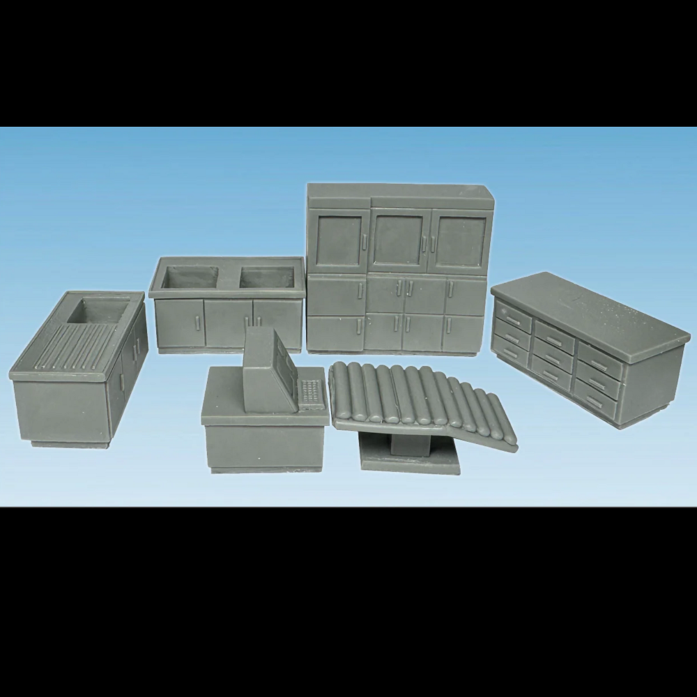 Crooked Dice Medical Room. A resin scenery set featuring sinks, cabinets, a workbench, and an examination bed. Supplied unpainted for customisation