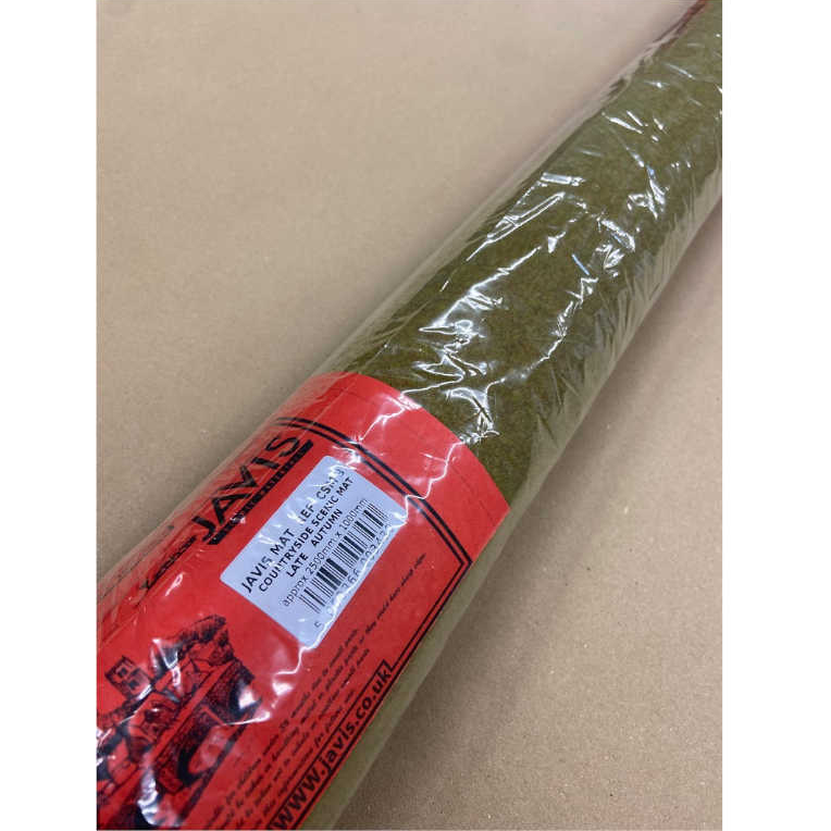 Large Late Autumn Mat By Javis Manufacturing. Rolled up gaming mat with a red label on a beige background