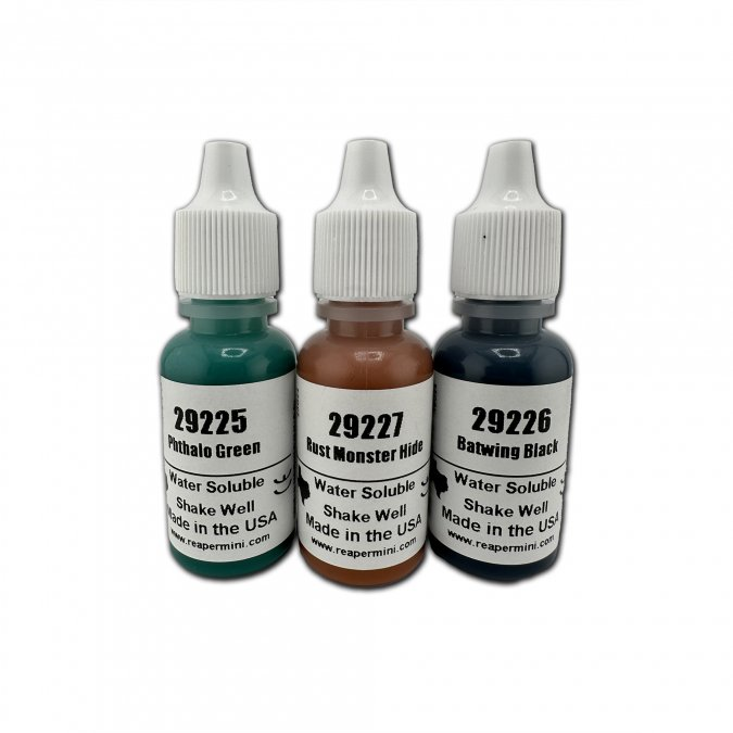 Three 1/2 oz dropper bottles of Master Series Paints Triads—Pthalo Green, Batwing Black, Rust Monster Hide. Matte finish, water soluble, airbrush friendly