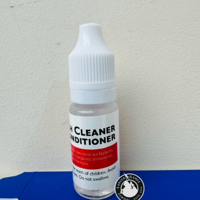 Bottle of 'brush Cleaner &Conditioner' with a label on a white background