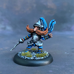The Knight by Northumbrian Tin Solider from their Nightfolk range pre painted by Mrs MLG.  A metal miniature knight with a blue adornment to his helm and a rather excellent moustache. 