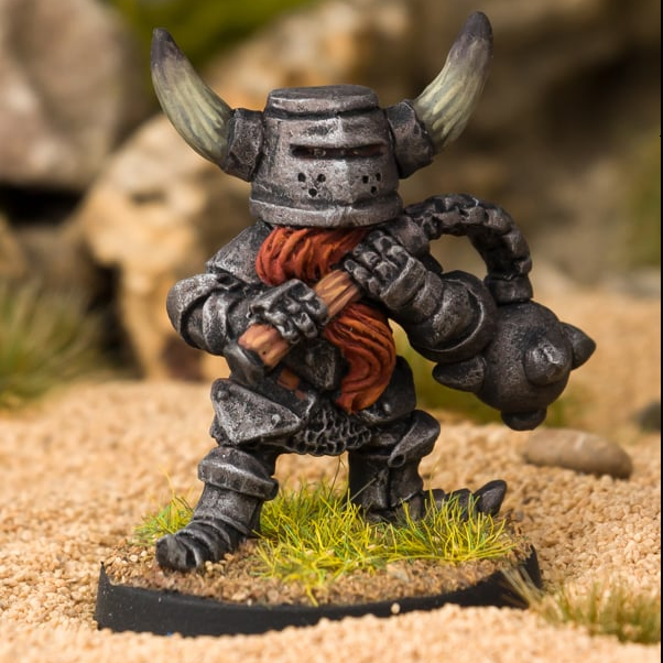 Sir Bucket from Northumbrian Tin Solider range of Nightfolk. This metal miniature depicts a very characterful knight with a horned helm, his beard poking out of the bottom towards his belly and his weapon in his hand.