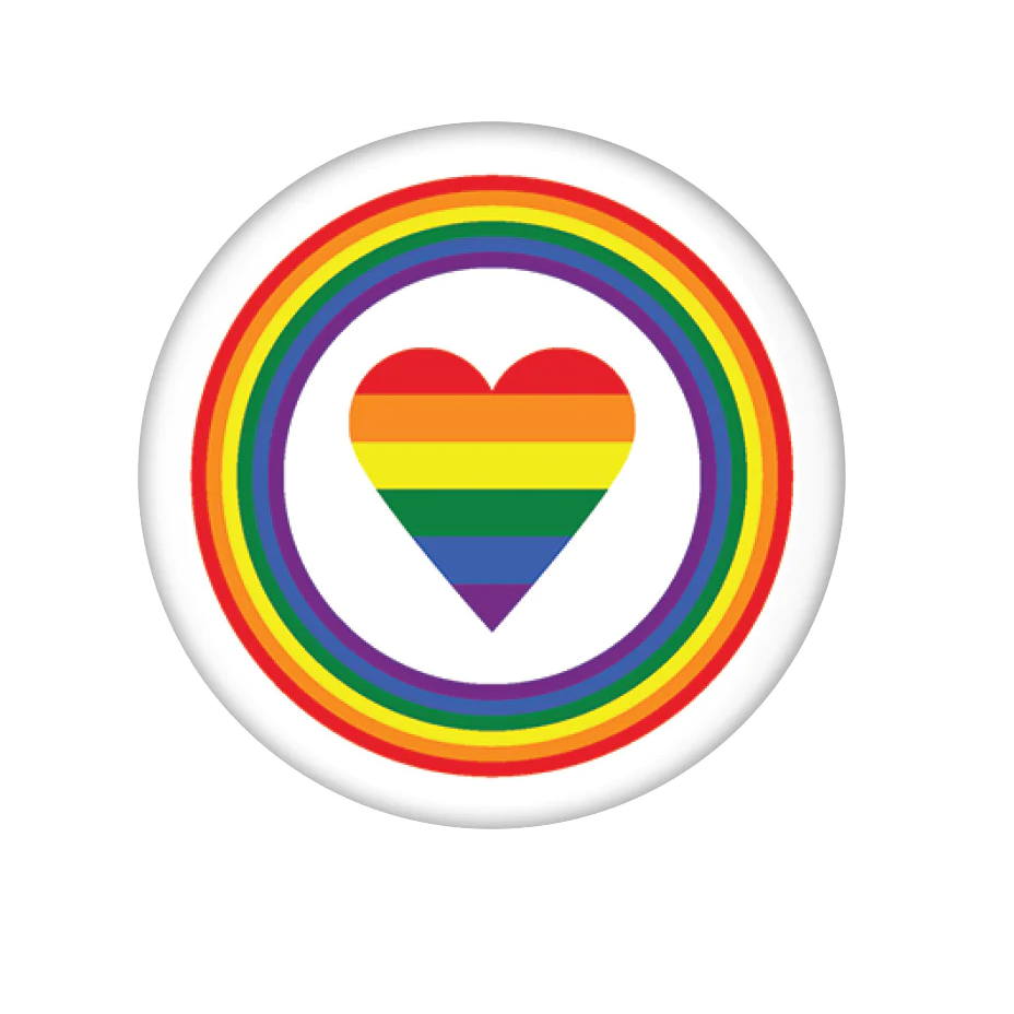 Rainbow Pride Heart Badge- A round white pin badge with rainbow circle and rainbow heart design for your bag, hat, jacket and more.