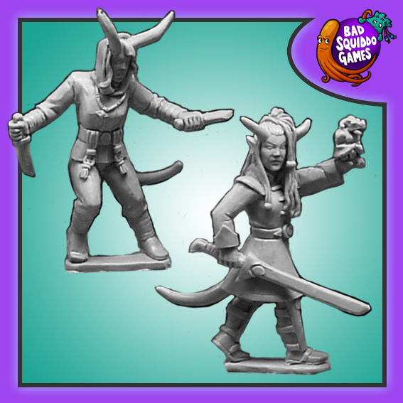 Tiefling Thief and Fighter by Bad Squiddo Games is a pack of two metal miniatures depicting a female thief and fighter from the Tiefling race, one holds a long sword and the other two short knives.