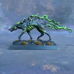 Hound Of Judgement by Reaper Miniatures pre painted by Mrs MLG.  A metal miniature  of a stalking canine with magical smoke billowing from its body as it hunts for in justice.