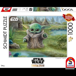 Star Wars The Mandalorian Child’s Play 1000 Piece Jigsaw Puzzle. A must have for any Star Wars fan this 1000 piece jigsaw puzzle captures a smiling 'Baby Yoda' with a village scene in the background making for a challenging puzzle.