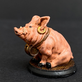 Hand painted pig with a barrel from the Reaper Miniatures range. Mrs MLG has painted this cute little pig with pink colouring, gold earing and black hooves.