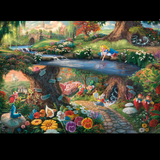 Disney Alice in Wonderland 1000 Piece Jigsaw Puzzle. A beautiful image by Thomas Kinkade of Alice and her kitten leaning over the water drawing shapes with her finger while the wonderland is just below with the white rabbit, mad hatter, Cheshire cat, tweedle dee and many more of your loved Alice in Wonderland characters making a magical jigsaw puzzle for a Disney fan.