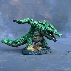 Werecrocodile by Reaper Miniatures from their Bones range pre painted by Mrs MLG.  A bones miniature of giant crocodile painted in greens.