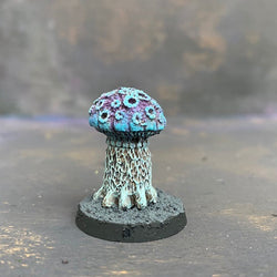 This metal miniature of a shrieking fungi is pre painted by Mrs MLG in purple and blues, a heavy little miniature from the not too distant past. 