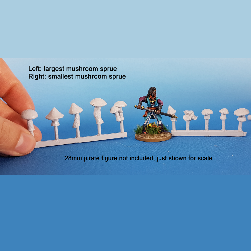Mushrooms by Bad Squiddo Games shown being held and with a pirate miniature for scale