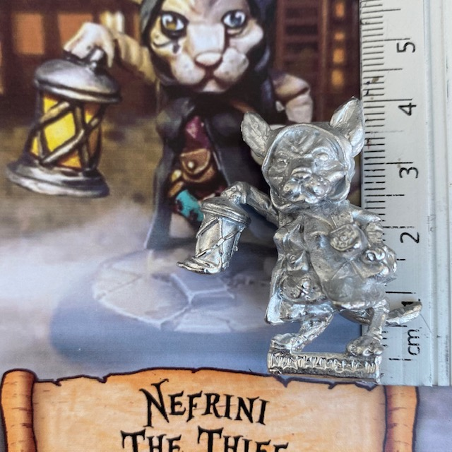 Nefrini is a thief from the Cats Of Crumptown range by Northumbrian Tin Soldier, this kitty carries a lantern and scrolls tucked under their arm
