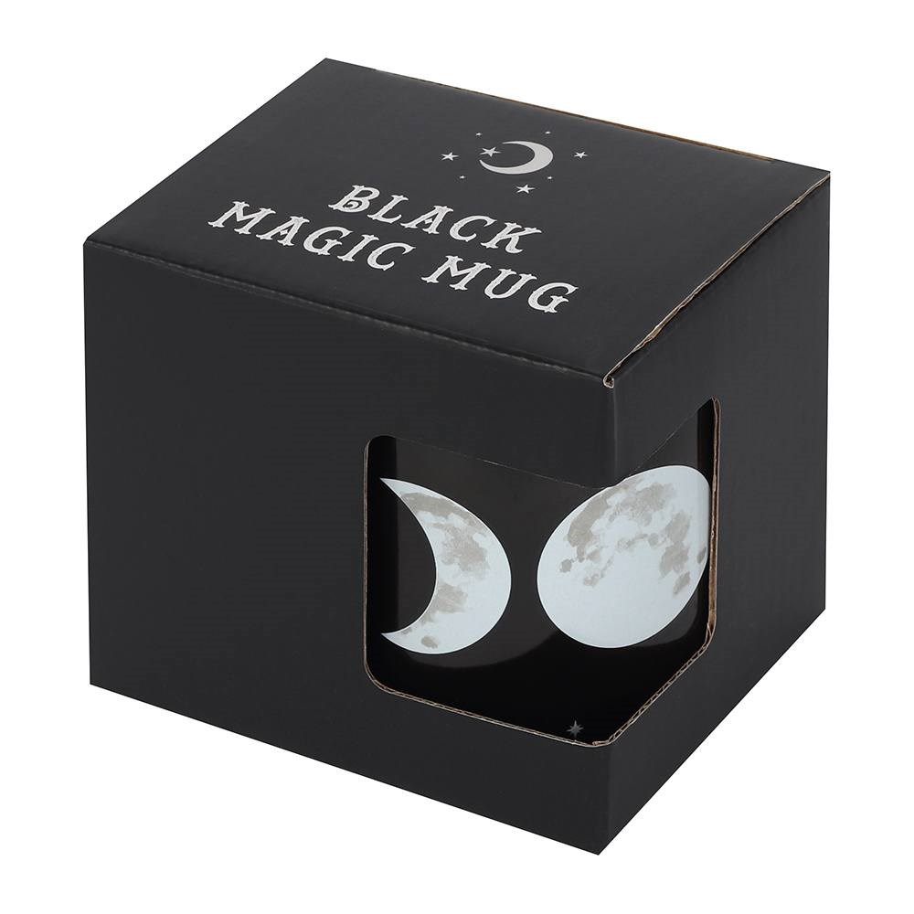 Black mug featuring the wiccan triple moon design in a box