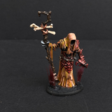 Hand painted necromancer from the Reaper Miniatures range. Mrs MLG has hand painted this undead miniature that has armour on one arm and bandages on the other. It also has long tufts on the base.  