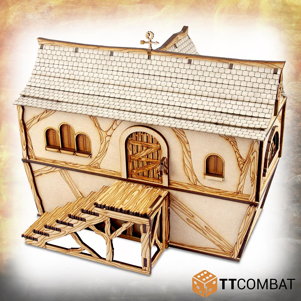 his MDF kit lets you build the Fancy Hat's Townhouse (so named as the resident of the house loves fancy hats), this elaborate building with its tiled roof, round and arched windows and back steps will make a great edition to your gaming table, RPG setting or diorama.- back view