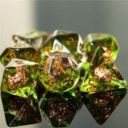 RPG Character class dice druid,  with black numbers, black swirling colour, green shade and a wold head shape in each one