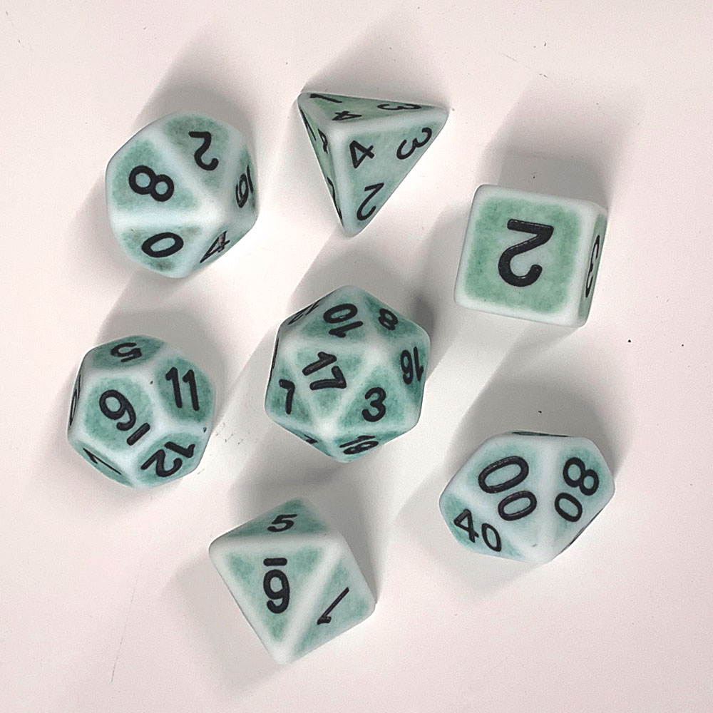 weathered ancient Pine Green RPG dice with a green blue colouring and black numbers . RPG D20 dice set