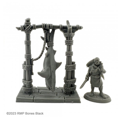 20741 Shark Butcher sculpted by C Van Patten from the Reaper Miniatures Bones Black range. A limited edition RPG miniature representing a fishmonger holding a knife, wearing an apron with a fish slung over his shoulder and a hung shark waiting to be butchered for your tabletop games.       