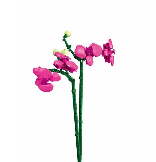 White vase with pink flowers on ...
