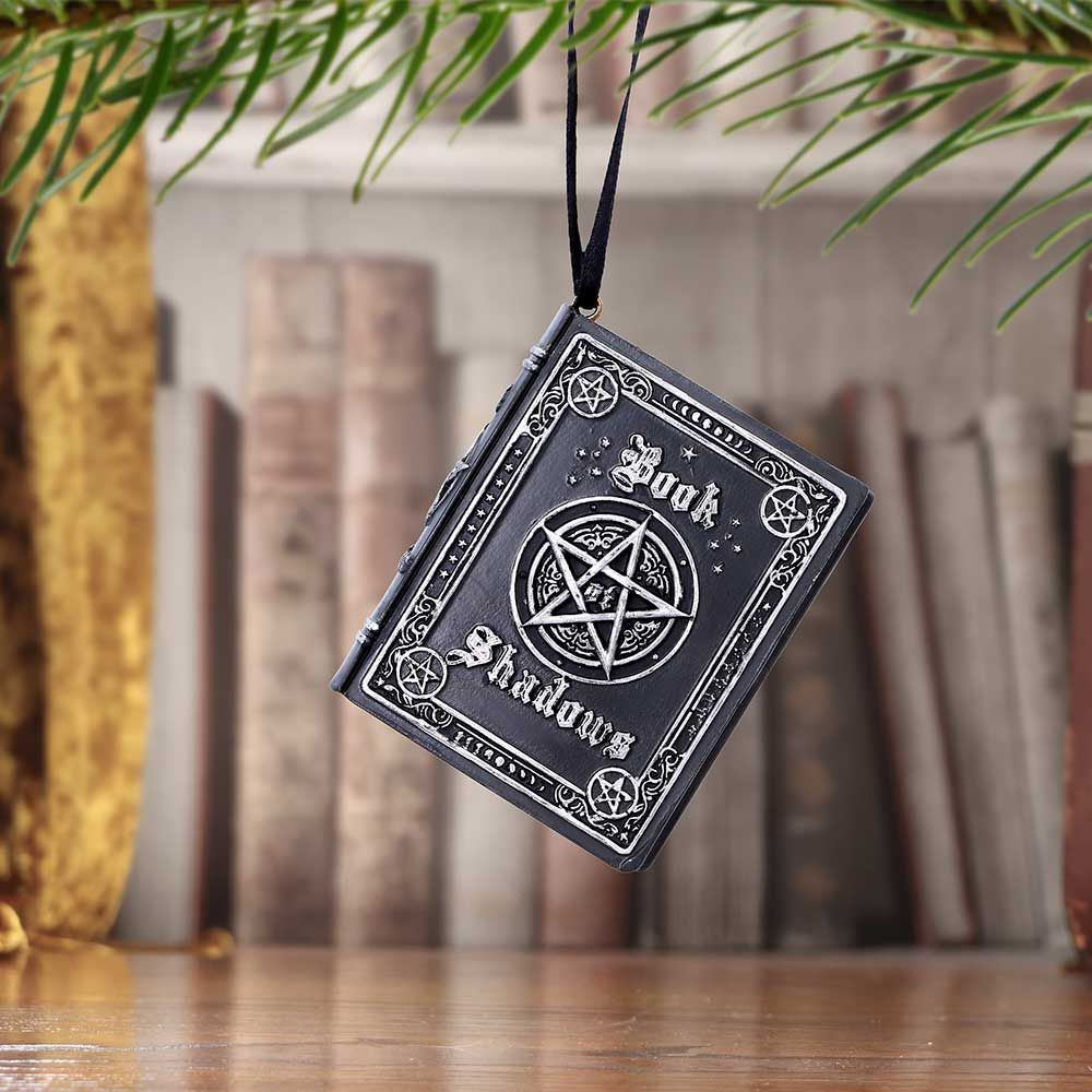 Book of Shadows Hanging Ornament by Nemesis Now. Crafted from polyresin and hand painted in a black and silver finish