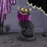 Furgus Black Cat With Purple Fea...