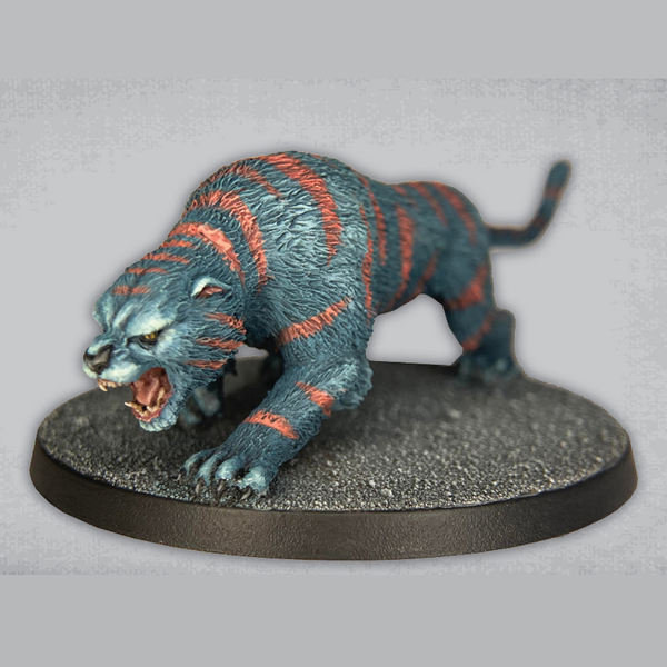 Big Cat by Crooked Dice, a 28mm scale resin miniature representing a large cat in an attack pose with mouth open being great hiding in long grass on your gaming table, as a statue that comes to life in your temple, monster for your RPG or companion in your pulp TV game.