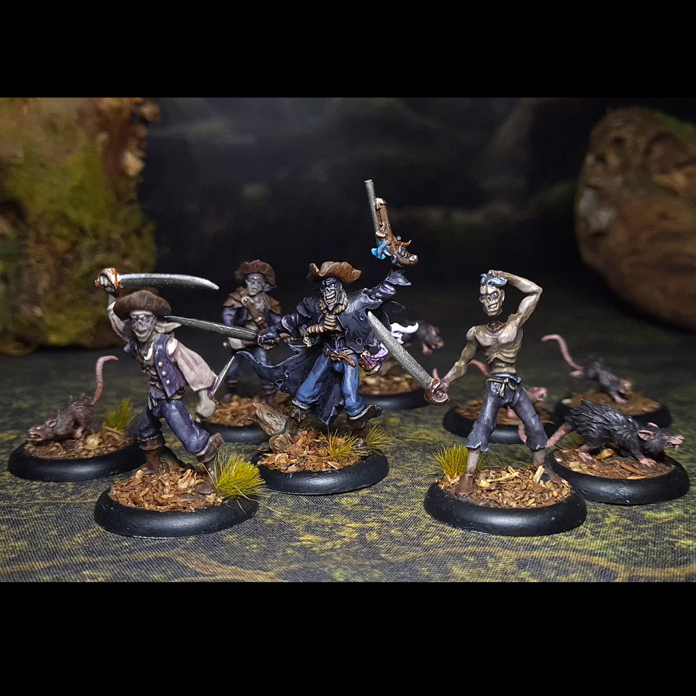 Undead Raiders Starter Warband for ArcWorlde second edition. Gangs of undead raiders pray on travellers brandishing swords and an axe. This starter warband contains heroic 28mm/32mm scale fantasy miniatures cast in white metal
