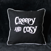 Creepy & Cosy Cushion. A bla...