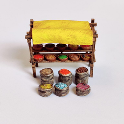 A Spice Markets Stall by Iron Gate Scenery in 28mm scale produced in PLA representing a wooden stall with cloth roof covering selling sacks of spices cart for your RPGs, town scenery and tabletop games.