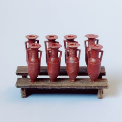 A pack of eight 28mm scale Amphora in resin by Iron Gate Scenery. Containers and shelf that they fit onto giving you the look&nbsp; of the ceramic pointed bottom jars for your tabletop gaming, dioramas, town scenery and more