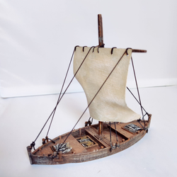 A fishing boat by Iron Gate Scenery in 28mm scale produced in PLA. Contains one boat, one mast, one sail, four oars and four fish markers (in resin ) making it a great edition to your tabletop gaming, RPGs and hobby dioramas.&nbsp;