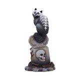 Gothic skull cat by Martin Handford from Nemesis Now. Perched on top of an ornate gravestone this black feline with green eyes and exposed skull and spine with add an unusual edition to your cat figurine collection for Halloween and all year round.