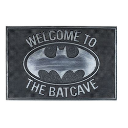 Welcome To The Batcave. A licensed Batman rubber door mat to welcome your friends to your home or your gaming space or as a gift for someone's new home, featuring the Batman symbol and the words Welcome To The Batcave.