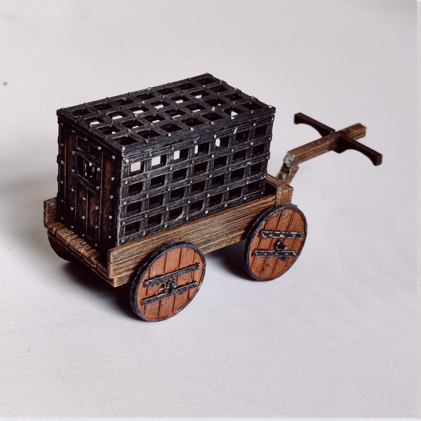 A Prisoner Cart by Iron Gate Scenery in 28mm scale produced in PLA &amp; resin representing a metal cage on a wooden cart adding detail and decoration to your tabletop gaming, RPGs and hobby dioramas.&nbsp; 